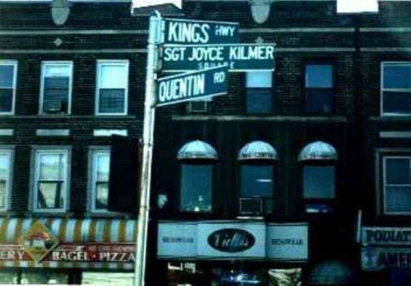 SGT. JOYCE KILMER SQUARE MEMORIAL STREET SIGN