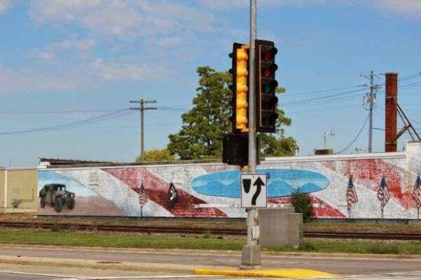 LAND OF THE FREE-HOME OF THE BRAVE MEMORIAL MURAL LEFT