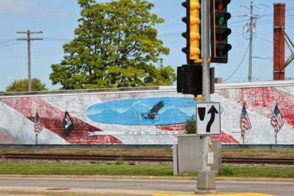 LAND OF THE FREE-HOME OF THE BRAVE MEMORIAL MURAL CENTER