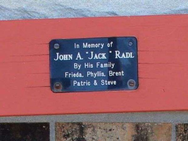IN MEMORY OF JOHN A. “JACK” RADL MEMORIAL BENCH PLAQUE