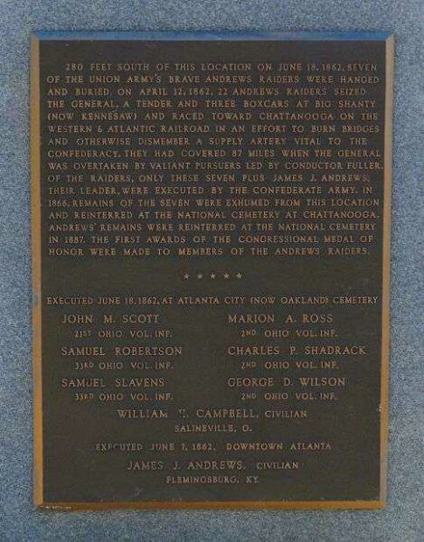 THE HANGING OF ANDREWS RAIDERS WAR MEMORIAL PLAQUE
