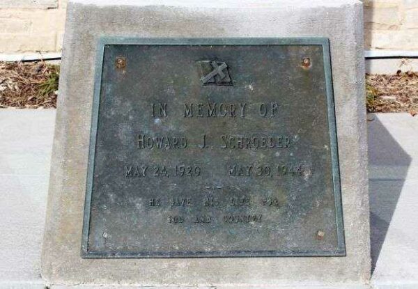 IN MEMORY OF HOWARD J. SCHROEDER MEMORIAL FLAGPOLE PLAQUE