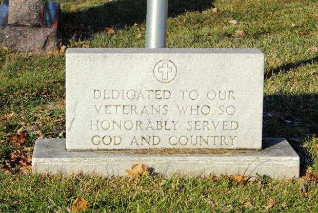 TRINITY LUTHERAN CEMETERY VETERANS MEMORIAL FLAGPOLE STONE