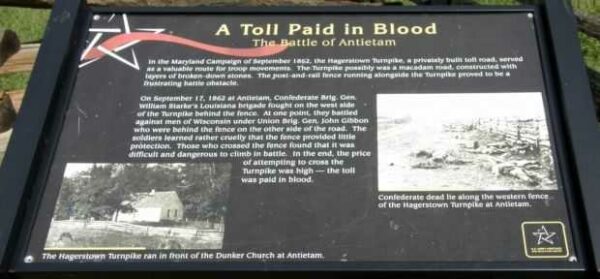 A TOLL PAID IN BLOOD MEMORIAL PLAQUE