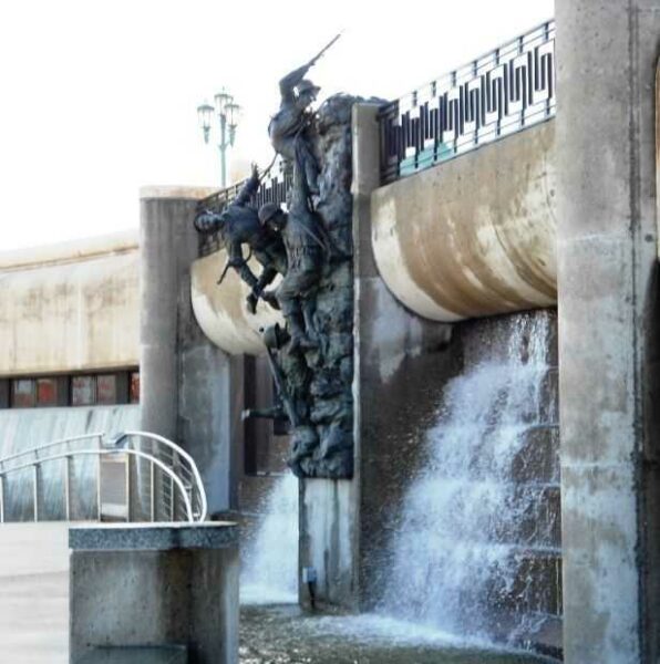THE NATIONAL D-DAY MEMORIAL SCALING POINTE DU HOC