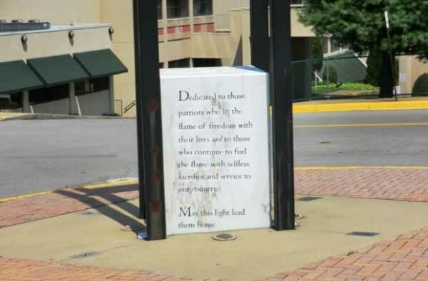THE FLAME OF FREEDOM MEMORIAL DEDICATION STONE