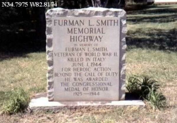 FURMAN L. SMITH MEMORIAL HIGHWAY