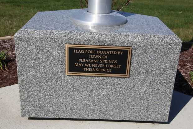 STOUGHTON AREA VETERANS MEMORIAL PARK FLAG POLE PLAQUE