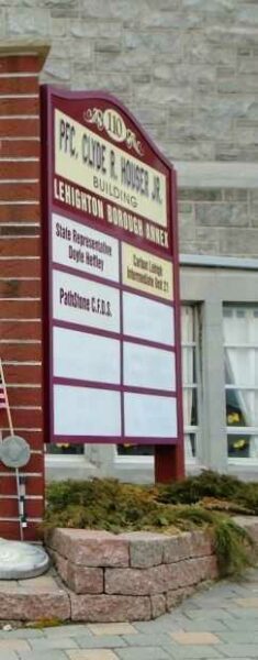 PFC. CLYDE R. HOUSER JR. MEMORIAL BUILDING PLAQUE