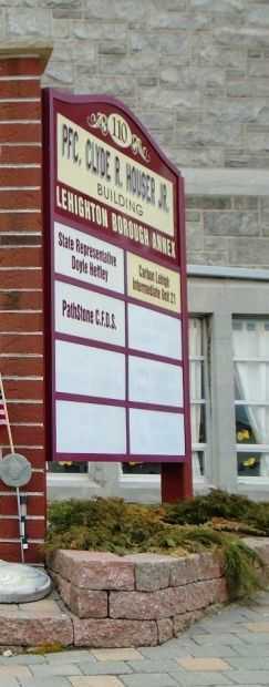 PFC. CLYDE R. HOUSER JR. MEMORIAL BUILDING PLAQUE
