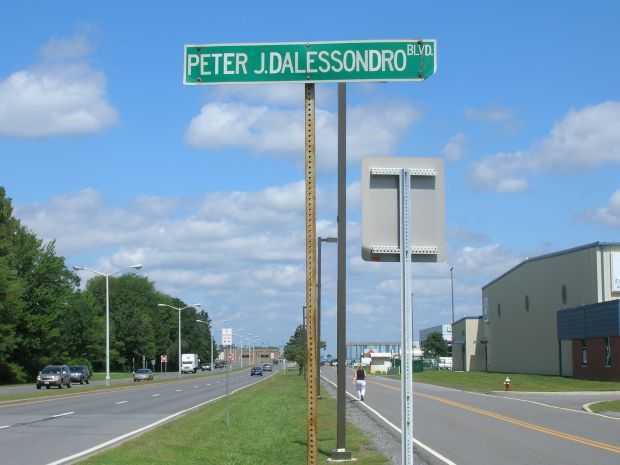 PETER J. DALESSANDRO BLVD WAR MEMORIAL STREET SIGN
