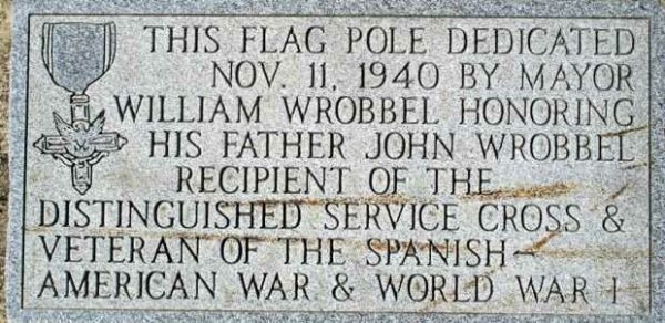 JOHN WROBBEL WAR MEMORIAL FLAG POLE DEDICATION STONE