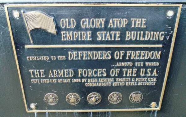 OLD GLORY ATOP THE EMPIRE STATE BUILDING MEMORIAL PLAQUE