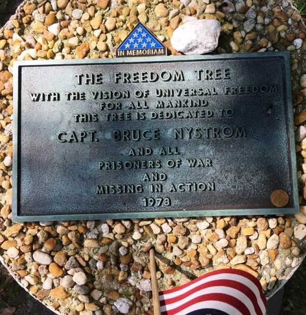THE FREEDOM TREE CAPT. BRUCE NYSTROM WAR MEMORIAL PLAQUE