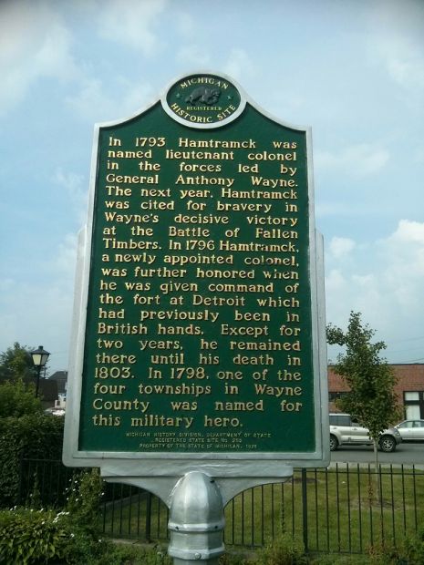 COLONEL JOHN FRANCIS HAMTRACK WAR MEMORIAL MARKER BACK