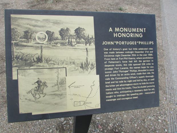 A MONUMENT HONORING MEMORIAL PLAQUE