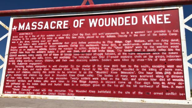 MASSACRE OF WOUNDED KNEE MEMORIAL MARKER BACK