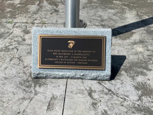 SAND LAKE VETERANS MEMORIAL PARK FLAGPOLE MEMORIAL PLAQUE