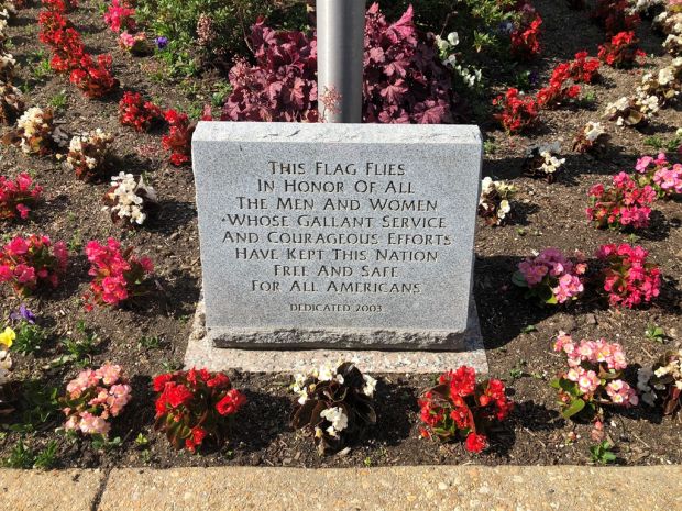 THIS FLAG FLIES MEMORIAL STONE