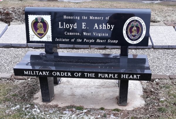 LLOYD E. ASHBY PURPLE HEART STAMP MEMORIAL BENCH