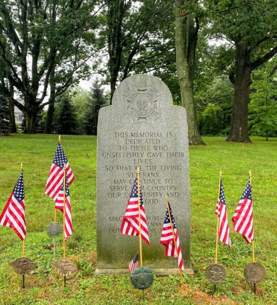 V.F.W. POST 5203 SUPREME SACRIFICE WAR MEMORIAL WITH FLAGS