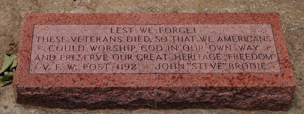 V.F.W. POST 1192 LEST WE FORGET WAR MEMORIAL FLAGPOLE STONE