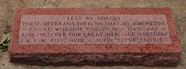 V.F.W. POST 1192 LEST WE FORGET WAR MEMORIAL FLAGPOLE STONE