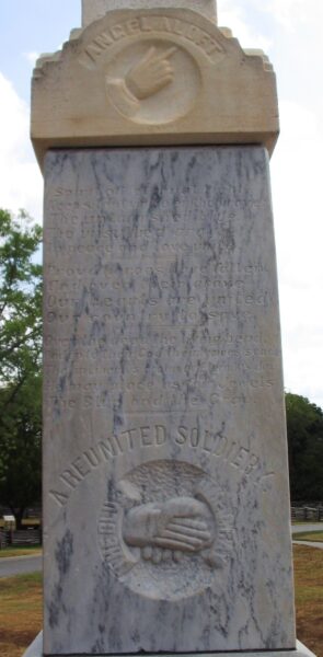 A REUNITED SOLDIERY WAR MEMORIAL STONE A