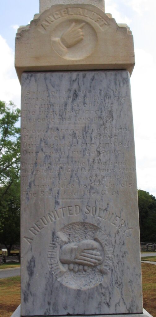 A REUNITED SOLDIERY WAR MEMORIAL STONE A