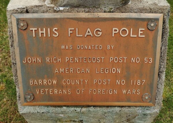 THIS FLAG POLE MEMORIAL PLAQUE