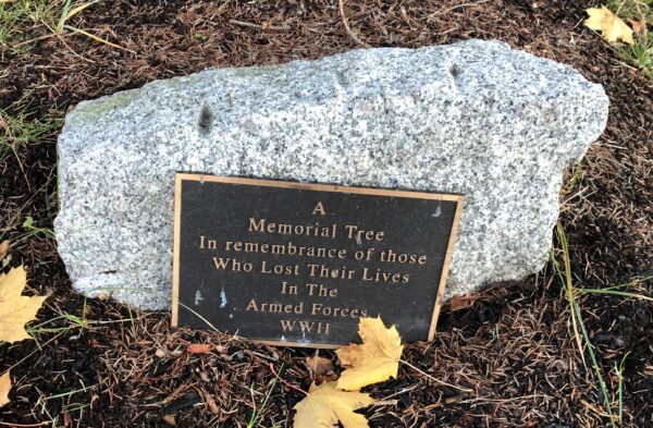 A WORLD WAR II MEMORIAL TREE PLAQUE