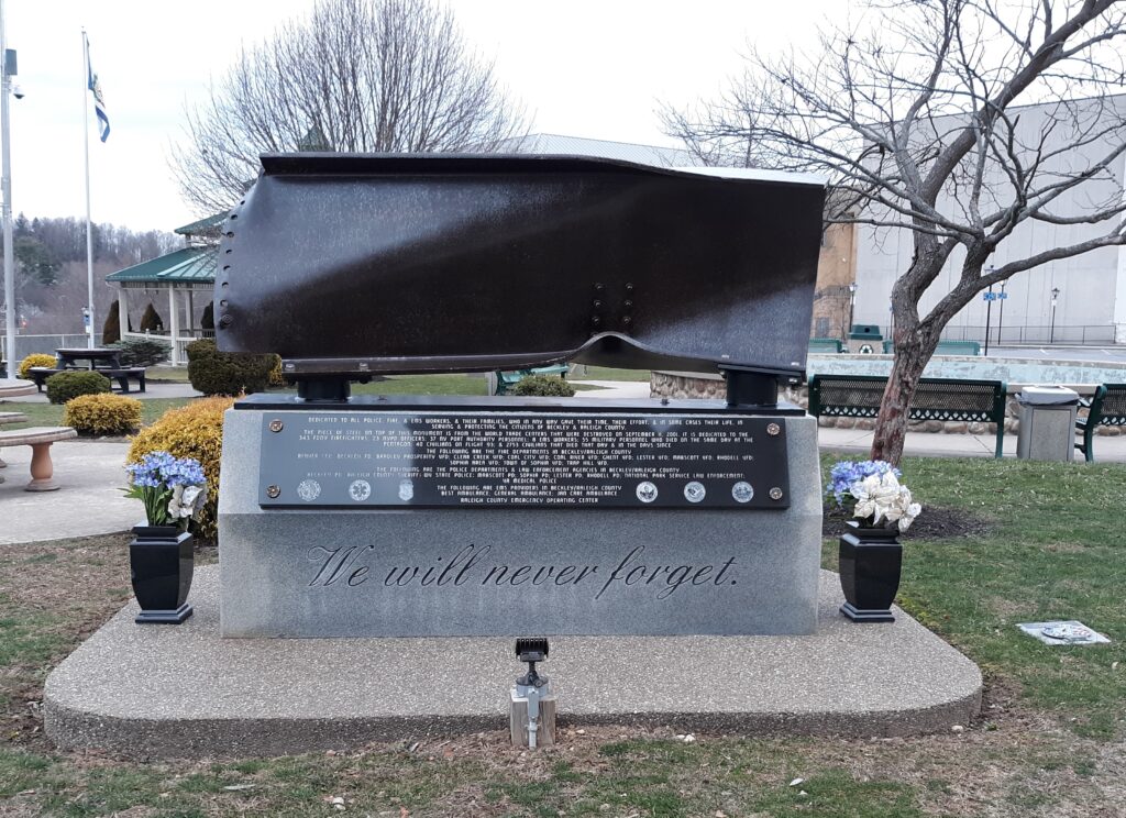 WE WILL NEVER FORGET MEMORIAL FRONT