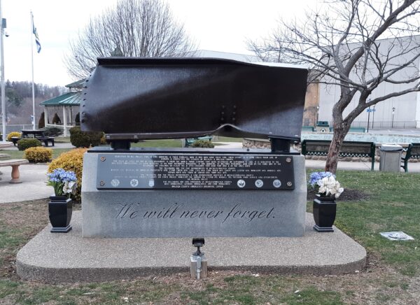 WE WILL NEVER FORGET MEMORIAL FRONT