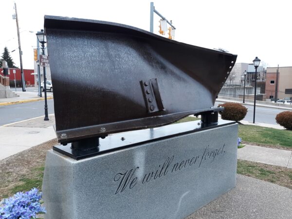 WE WILL NEVER FORGET MEMORIAL BACK