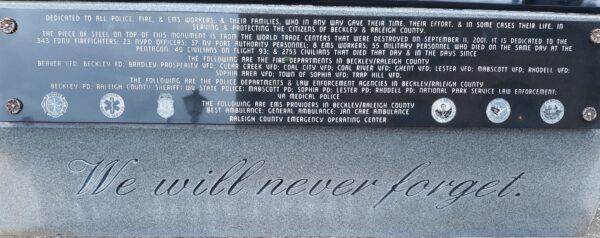 WE WILL NEVER FORGET MEMORIAL PLAQUE