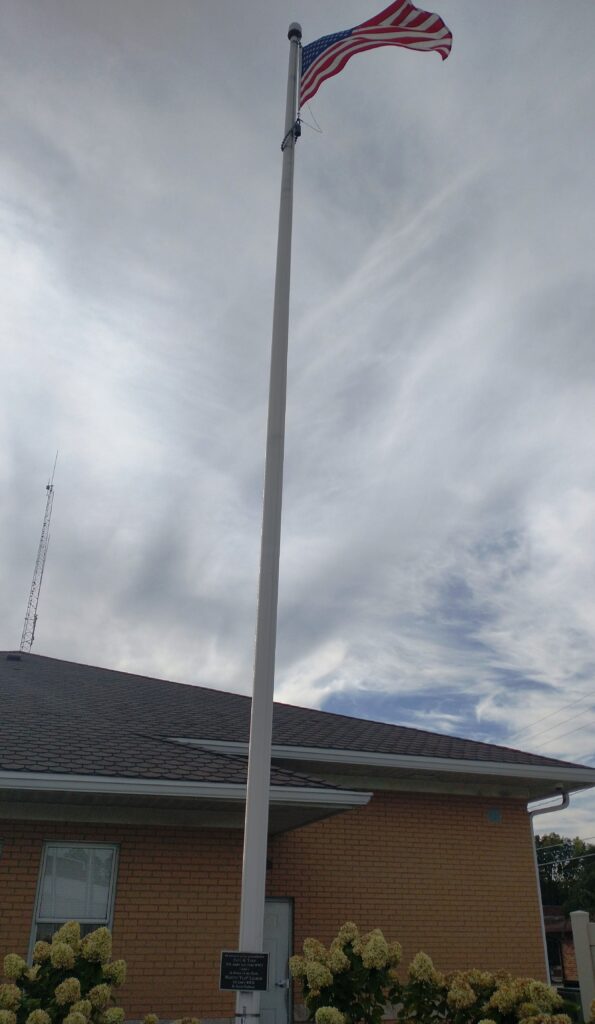 PAUL M. YOKE VETERANS MEMORIAL FLAGPOLE