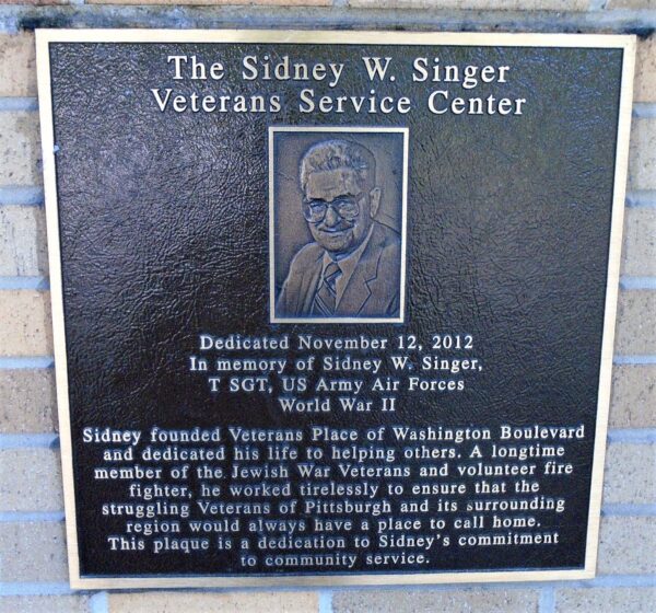 THE SIDNEY W. SINGER VETERANS SERVICE CENTER MEMORIAL PLAQUE