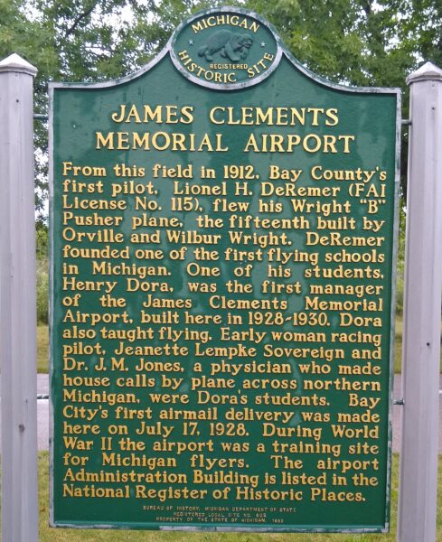 JAMES CLEMENTS MEMORIAL AIRPORT MARKER BACK