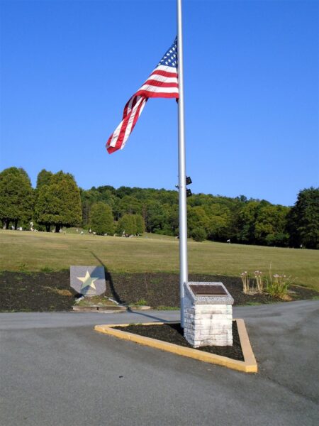 FLAG FLYING IN MEMORY OF FREDERICK PRESTON MEMORIAL