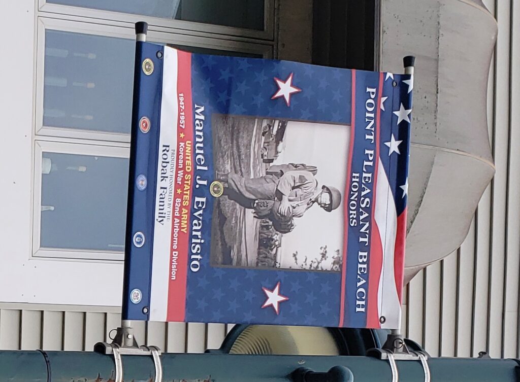 MANUEL J. EVARISTO WAR MEMORIAL BANNER