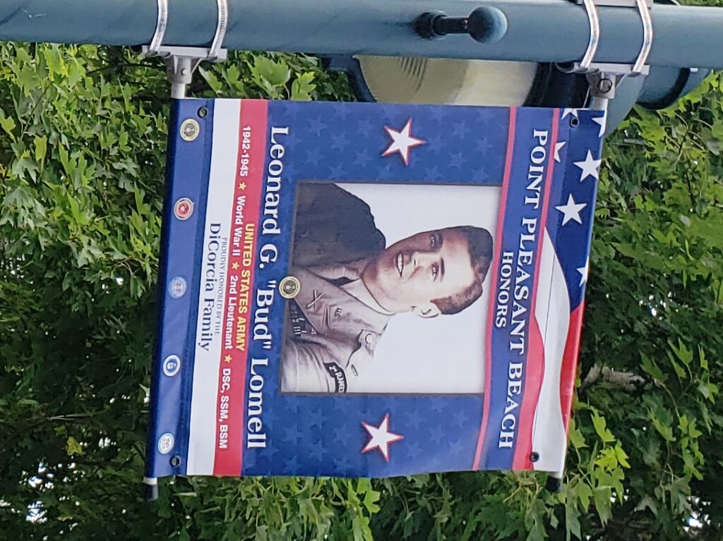 LEONARD G. “BUD” LOMELL WAR MEMORIAL BANNER