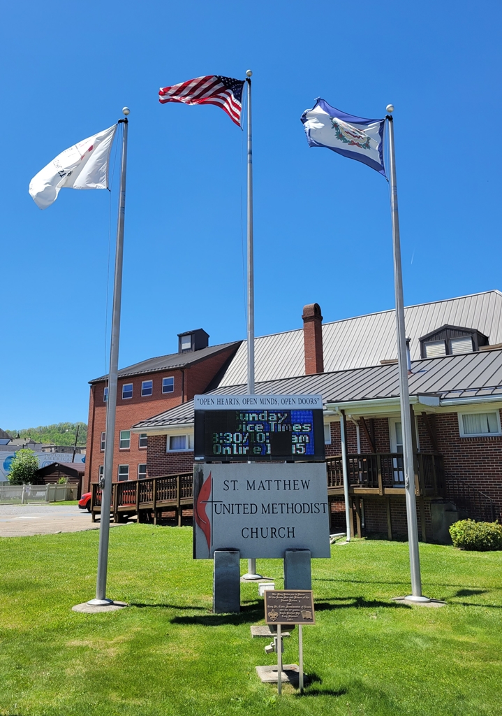 VETERANS OF ARMED FORCES AND GARY ST. CLAIR MEMORIAL FLAG POLES