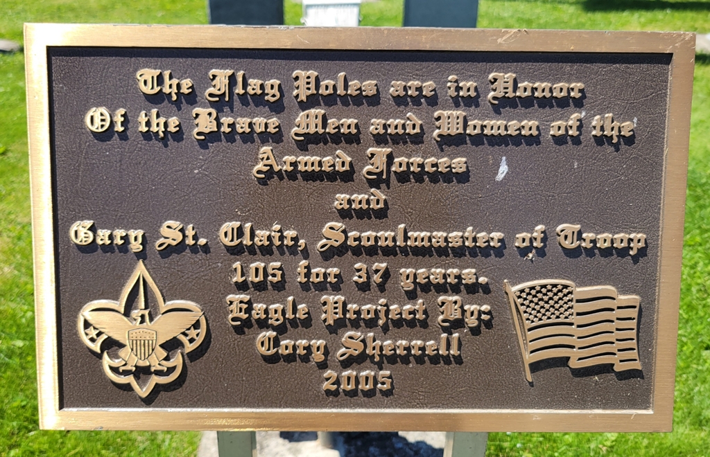 VETERANS OF ARMED FORCES AND GARY ST. CLAIR MEMORIAL FLAG POLES PLAQUE