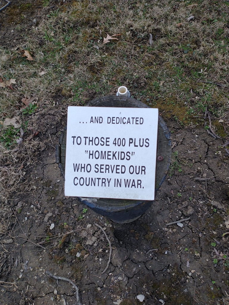 AND DEDICATED WAR MEMORIAL BOLLARD