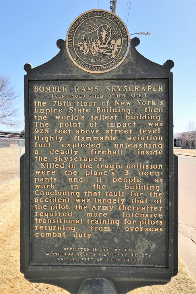 BOMBER RAMS SKYSCRAPER WAR MEMORIAL