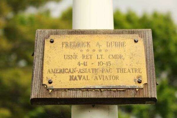 LT. CMDR. FREDRICK A. DUBBE MEMORIAL FLAG POLE PLAQUE