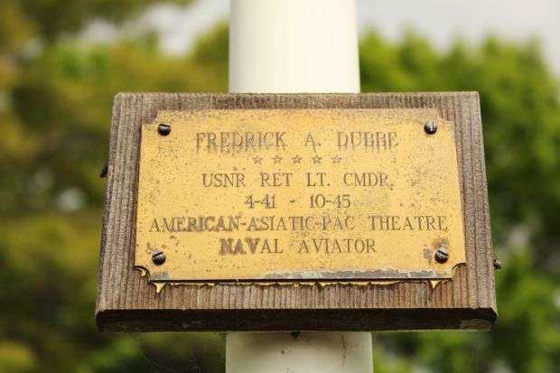 LT. CMDR. FREDRICK A. DUBBE MEMORIAL FLAG POLE PLAQUE