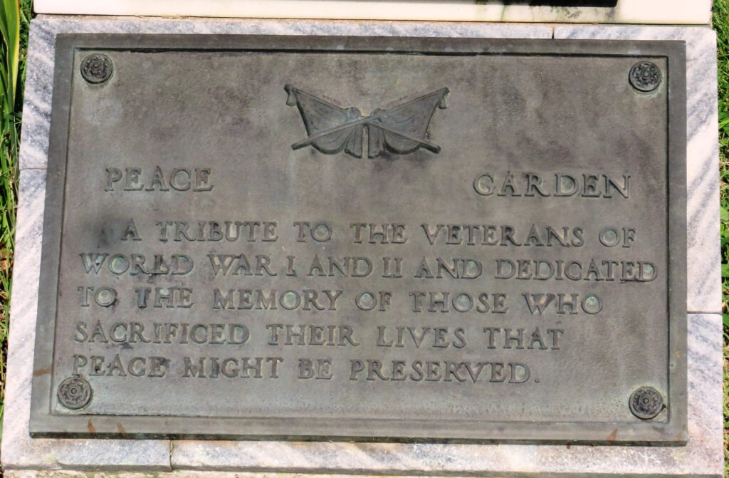 CEMENT AREA VETERANS MEMORIAL AND PEACE GARDEN PLAQUE A
