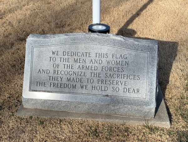 WE DEDICATED THIS FLAG MEMORIAL STONE