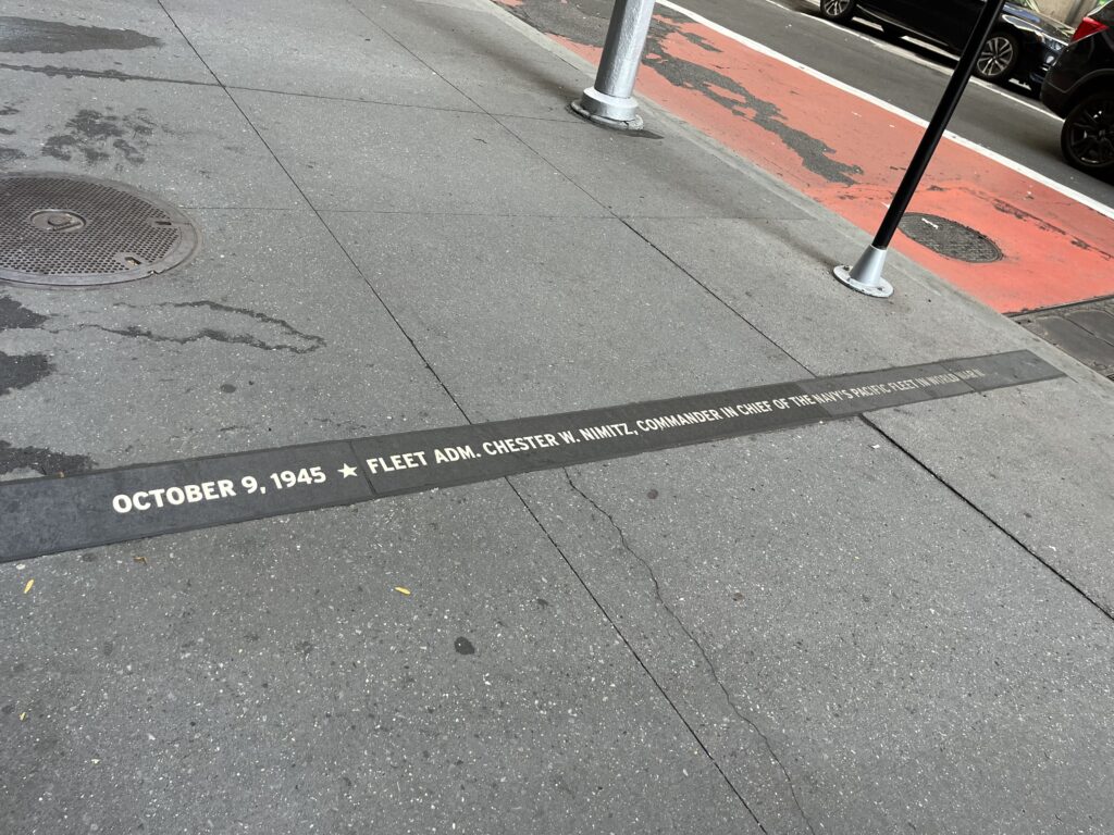 OCTOBER 9,1945 FLEET ADM. CHESTER W. NIMITZ SIDEWALK WAR MEMORIAL